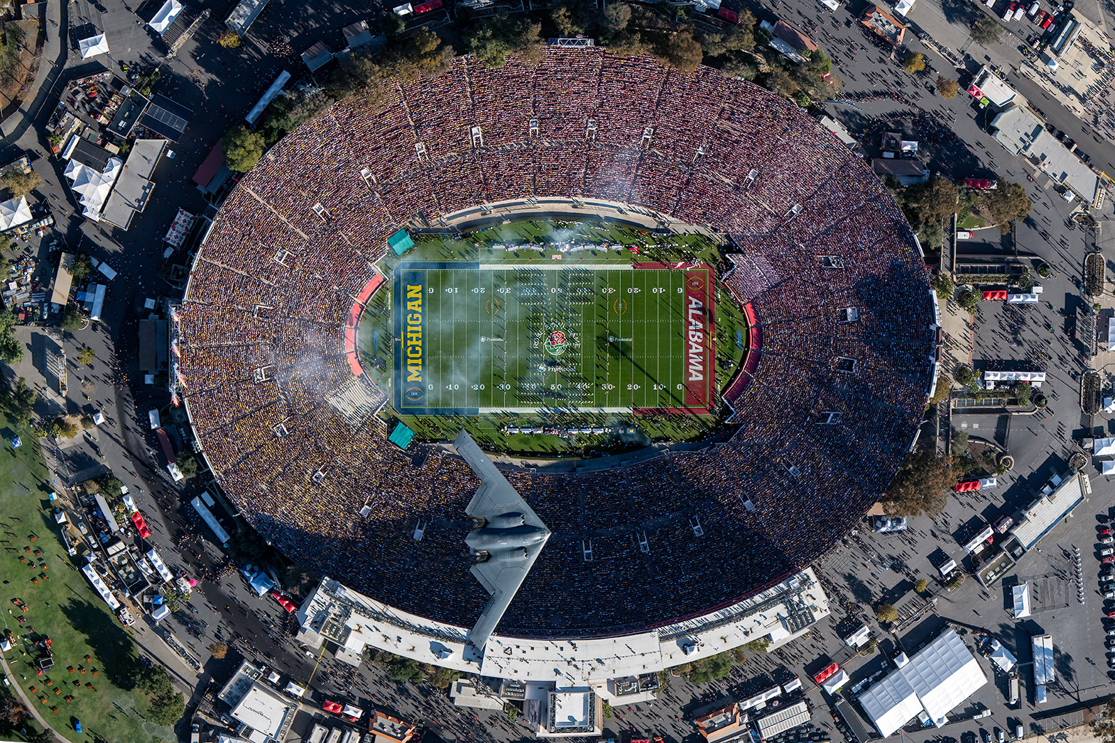 A B-2 stealth bomber flies over the soldout stadium during the 2023 Rose Bowl Game