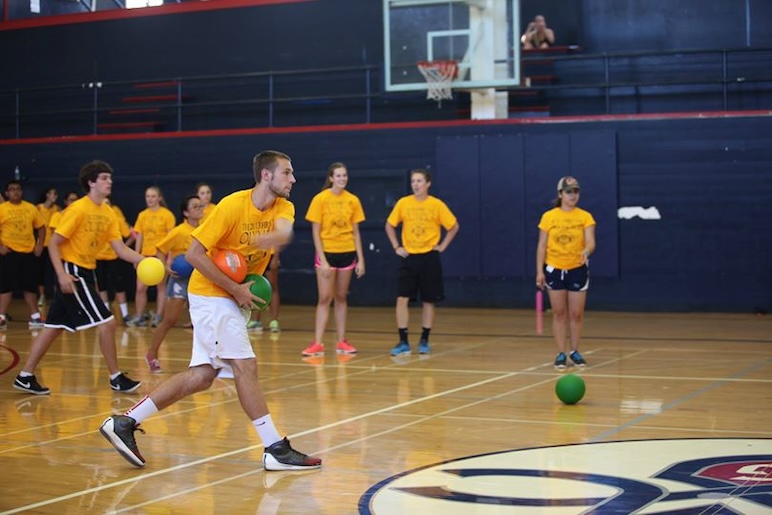 Calvin Hermanson ’17 playing dodgeball in 2013 first year olympics