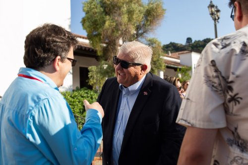 Roger Thompson speaks with an alumnus at Reunion 2024