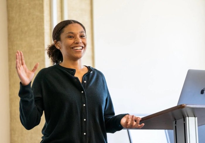 Female MA in Communications student speaking