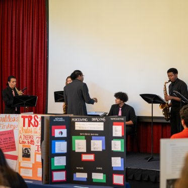 Band playing at the conference in the Moraga Room