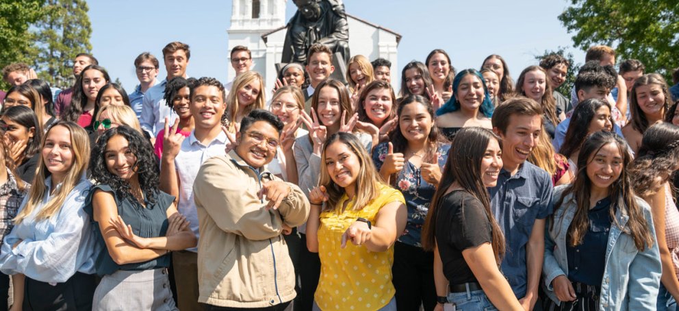 students excited outside chapel