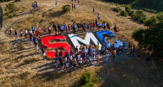 Students painting the SMC at Saint Mary's College