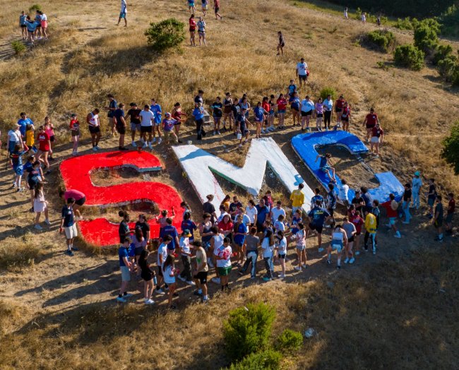 Students painting the SMC at Saint Mary's College