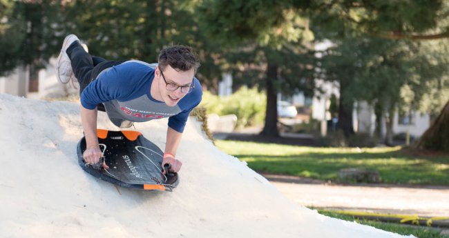 Saint Mary's College student sledding