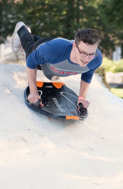 Saint Mary's College student sledding